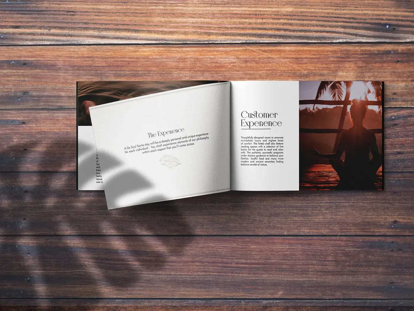 Open De Soul Santé hospitality brochure on a wooden table