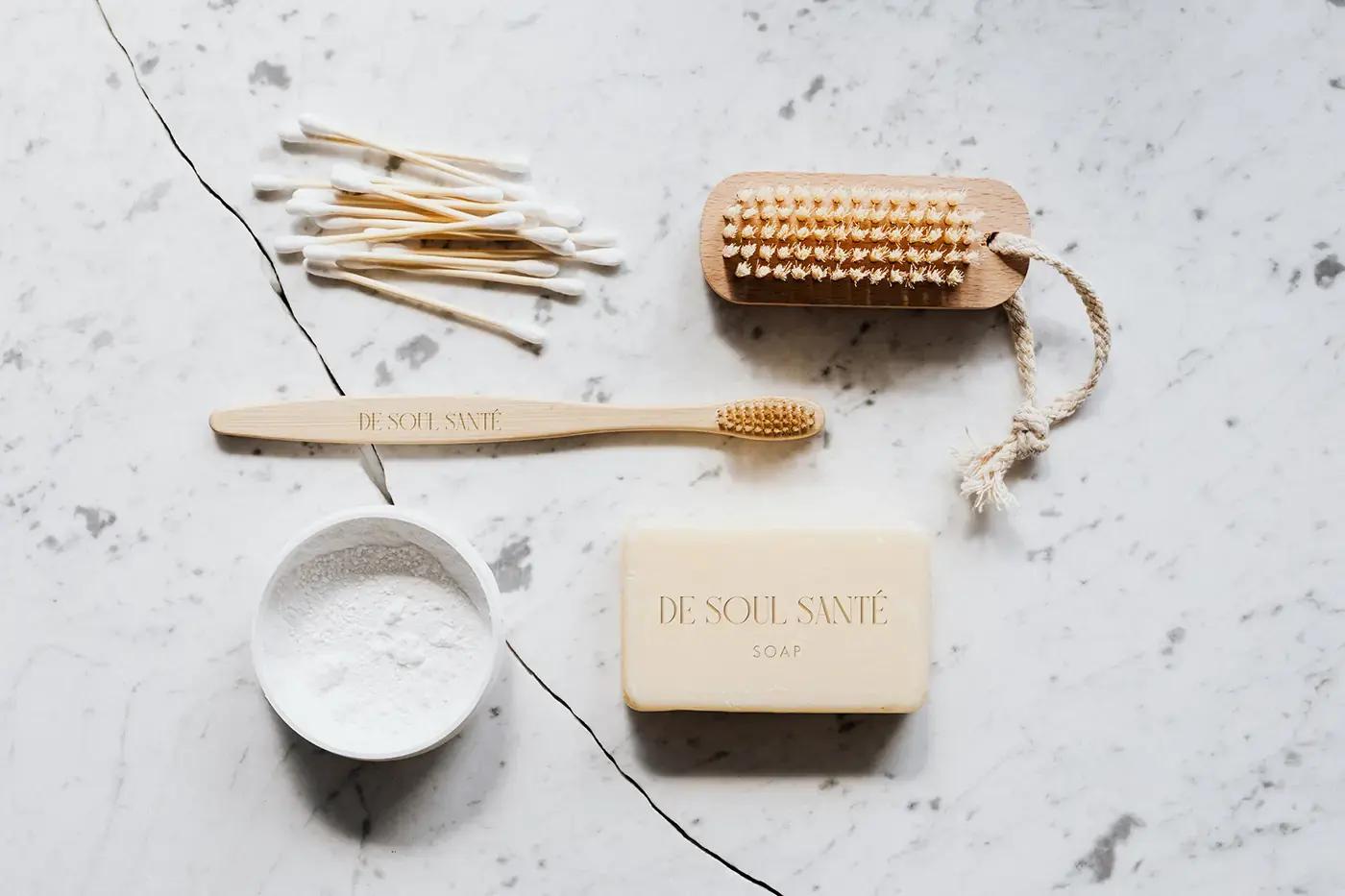 De Soul Santé guest amenities arranged on pale stone