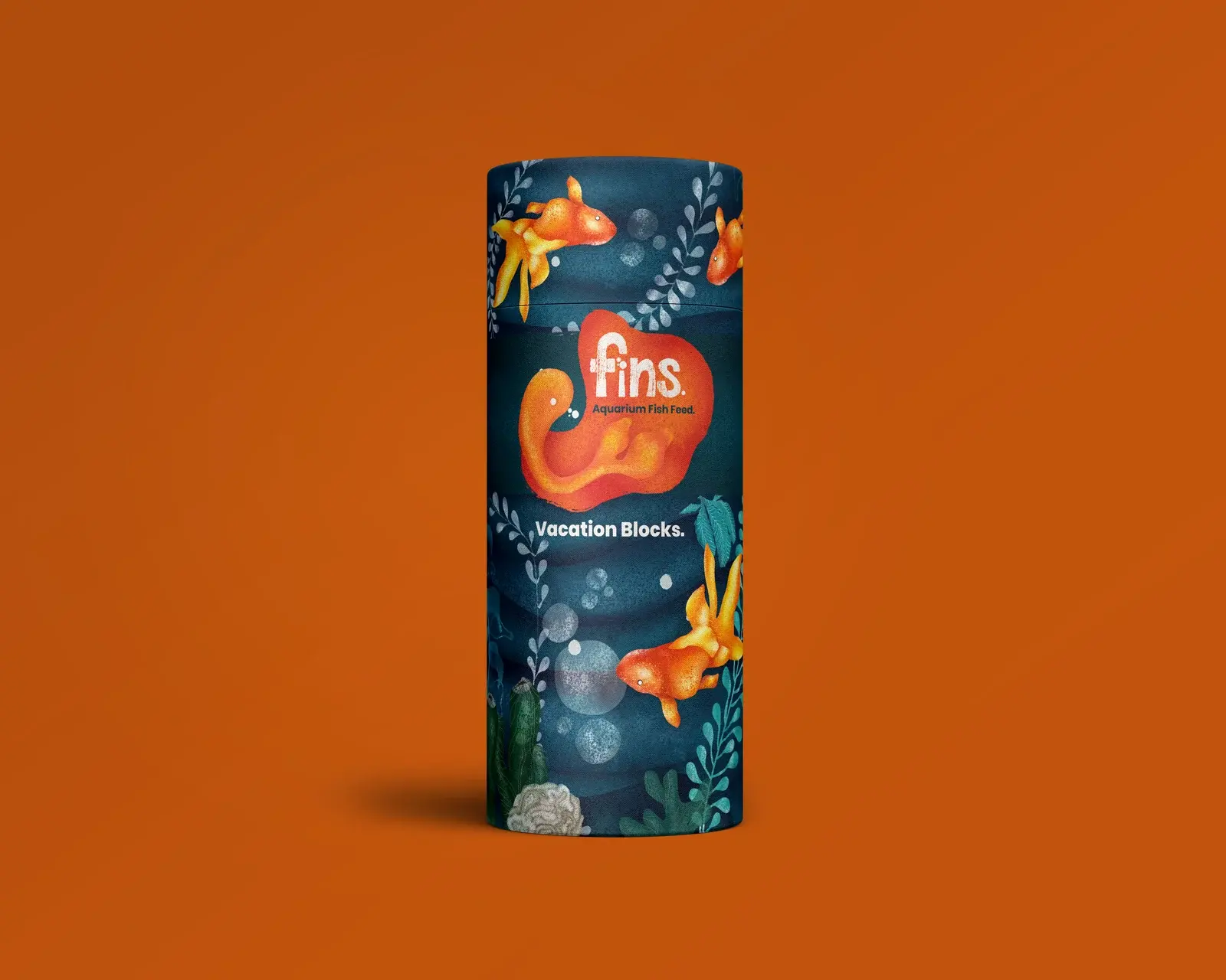 Fins Vacation Blocks paperboard tube on a burnt-orange background