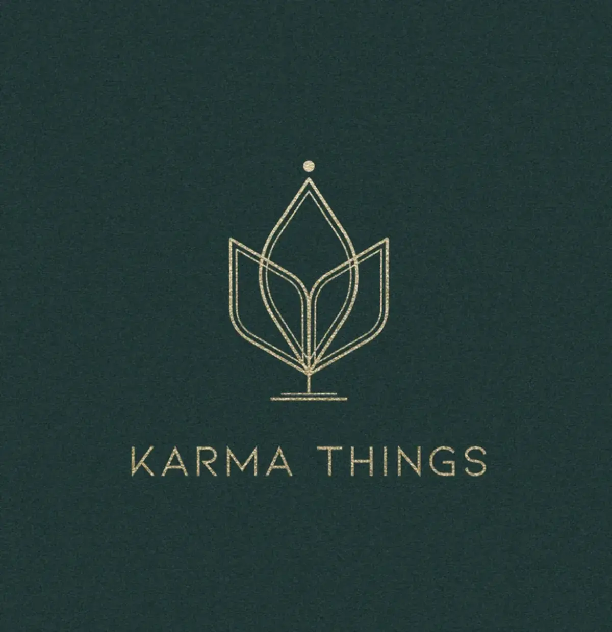 Gold Karma Things floral emblem and wordmark on deep forest green